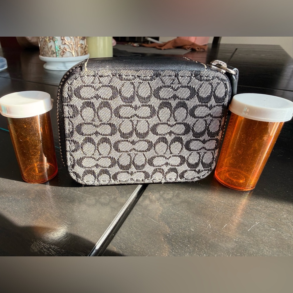 Coach pill case black signature fabric